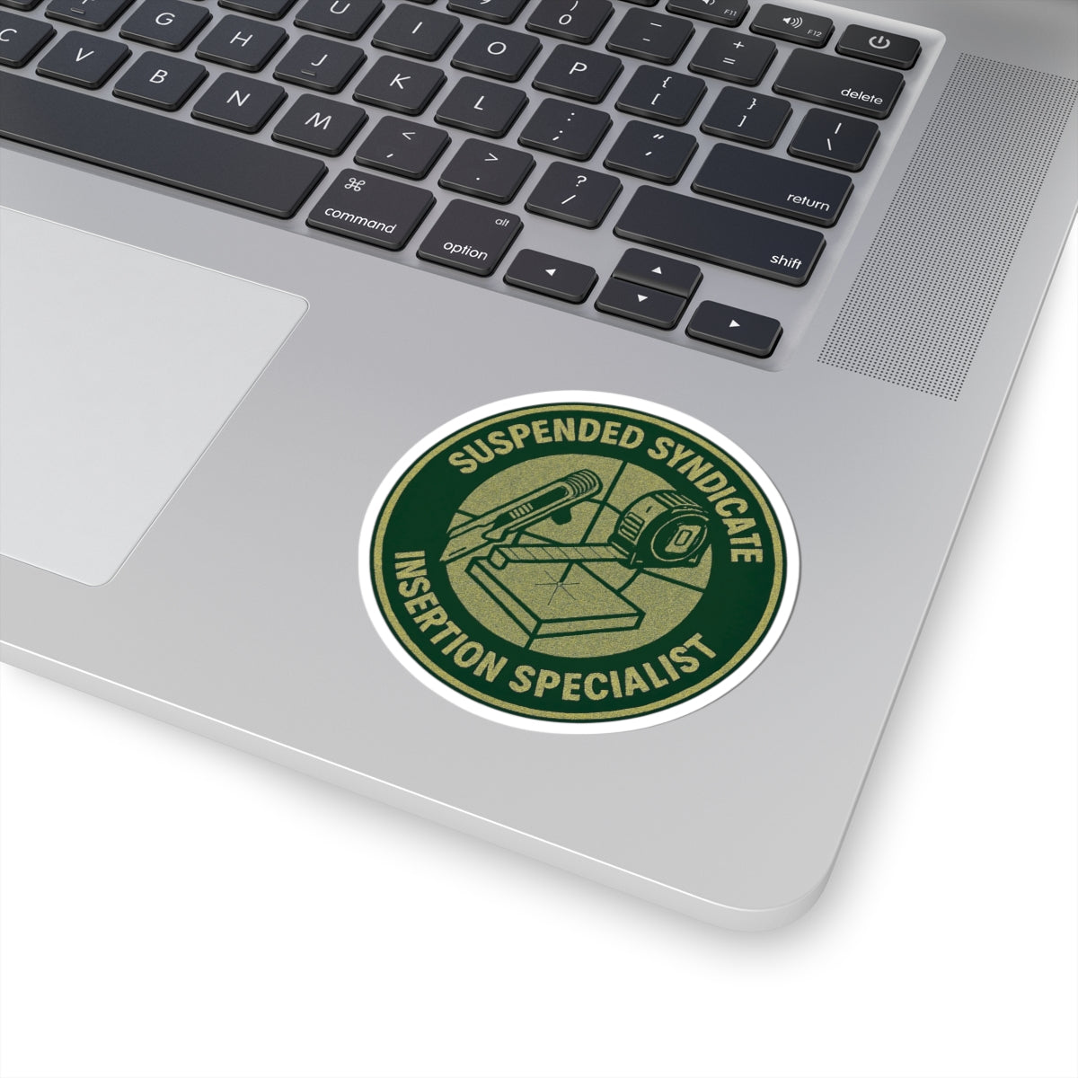 “Suspended Syndicate. Insertion Specialist” kiss-cut sticker