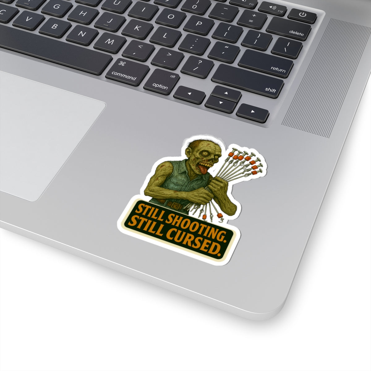 Still shooting. Still cursed. - Zombie Ceiling wire shooter Sticker