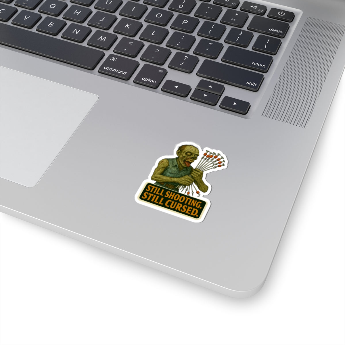 Still shooting. Still cursed. - Zombie Ceiling wire shooter Sticker