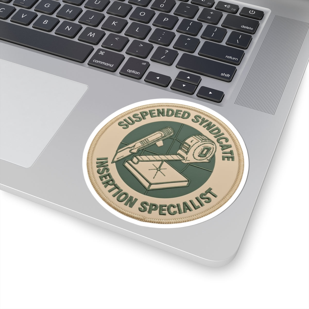 “Suspended Syndicate. Insertion Specialist” (light pvc patch version) kiss-cut sticker