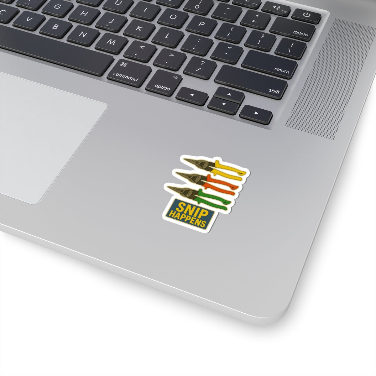 “Snip Happens” with reds, yellows, greens. - kiss-cut sticker