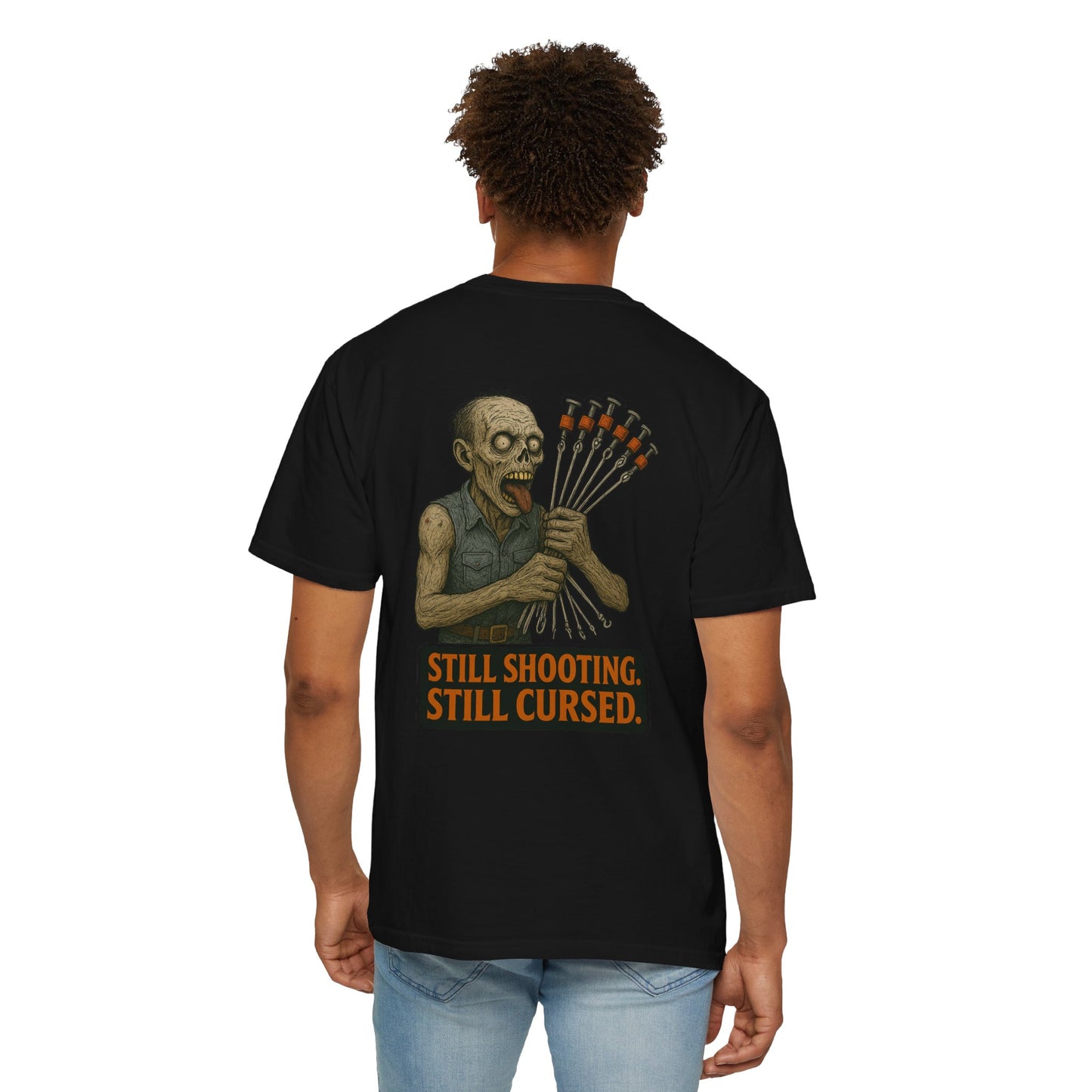 “Still Shooting. Still Cursed” (print on back)  Zombie Ceiling wire shooter - shirt