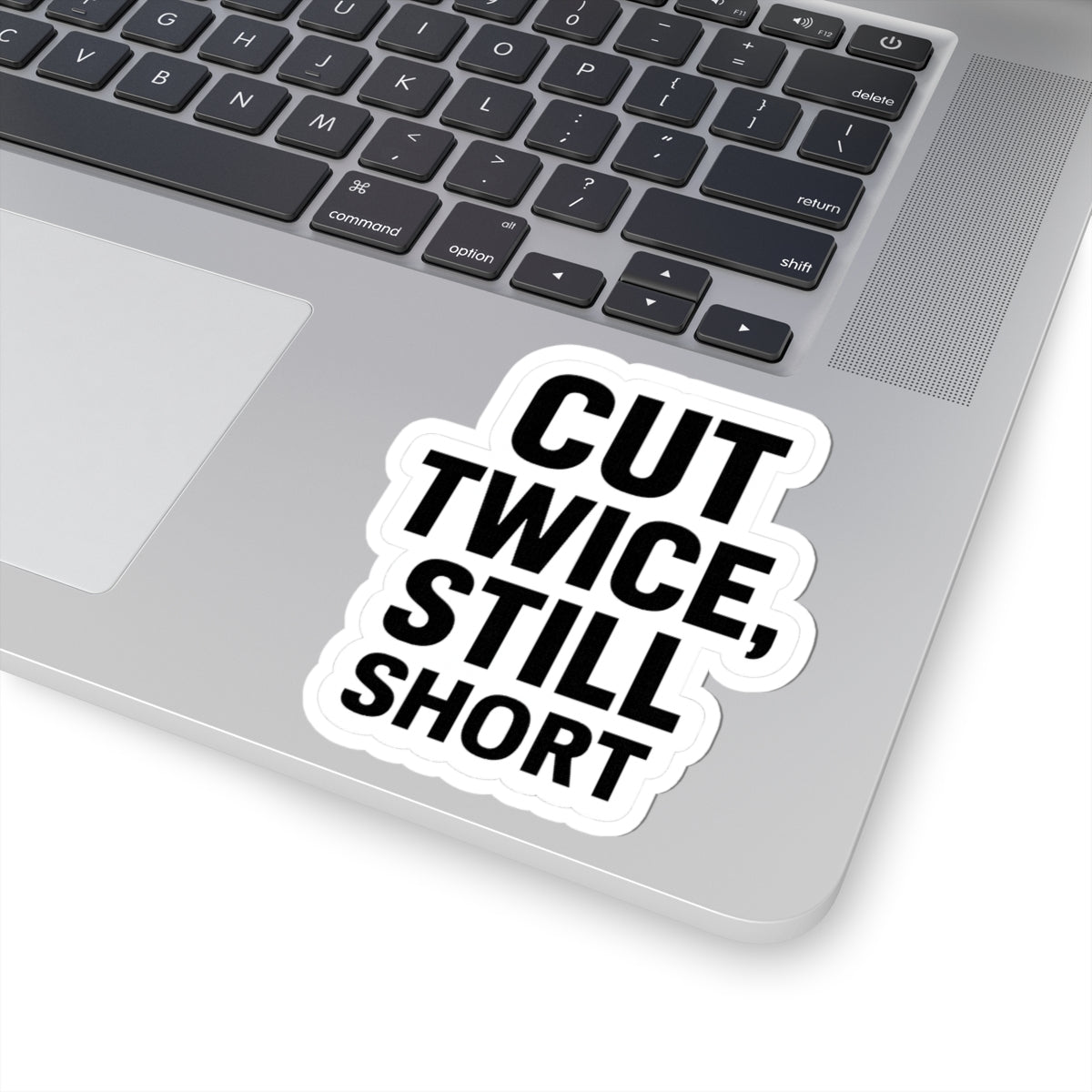 “Cut twice. Still short.” Sticker for carpenters or DIY people.