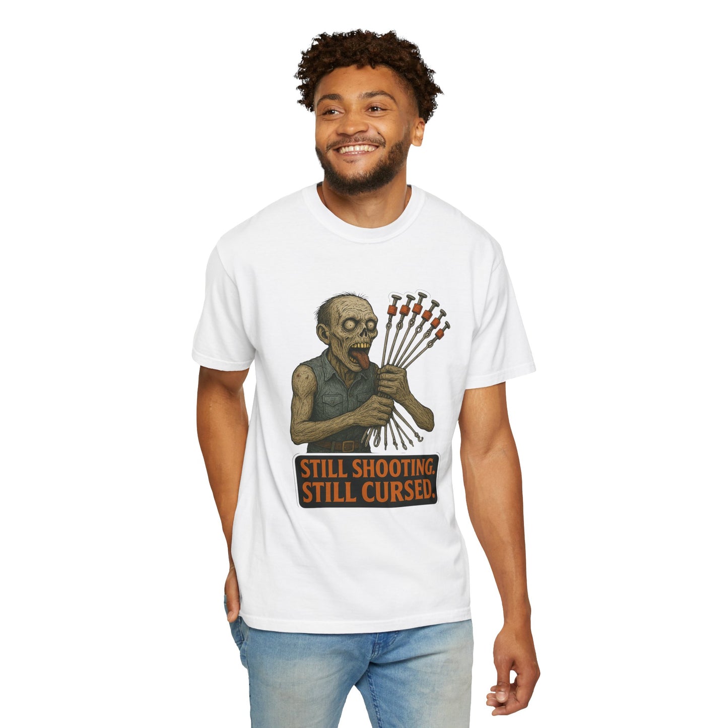 “Still Shooting. Still Cursed” (print on front) Zombie Ceiling Wire Shooter shirt