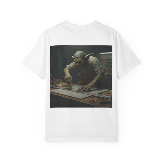 Grid Goblin using a straight edge to cut a panel - shirt
