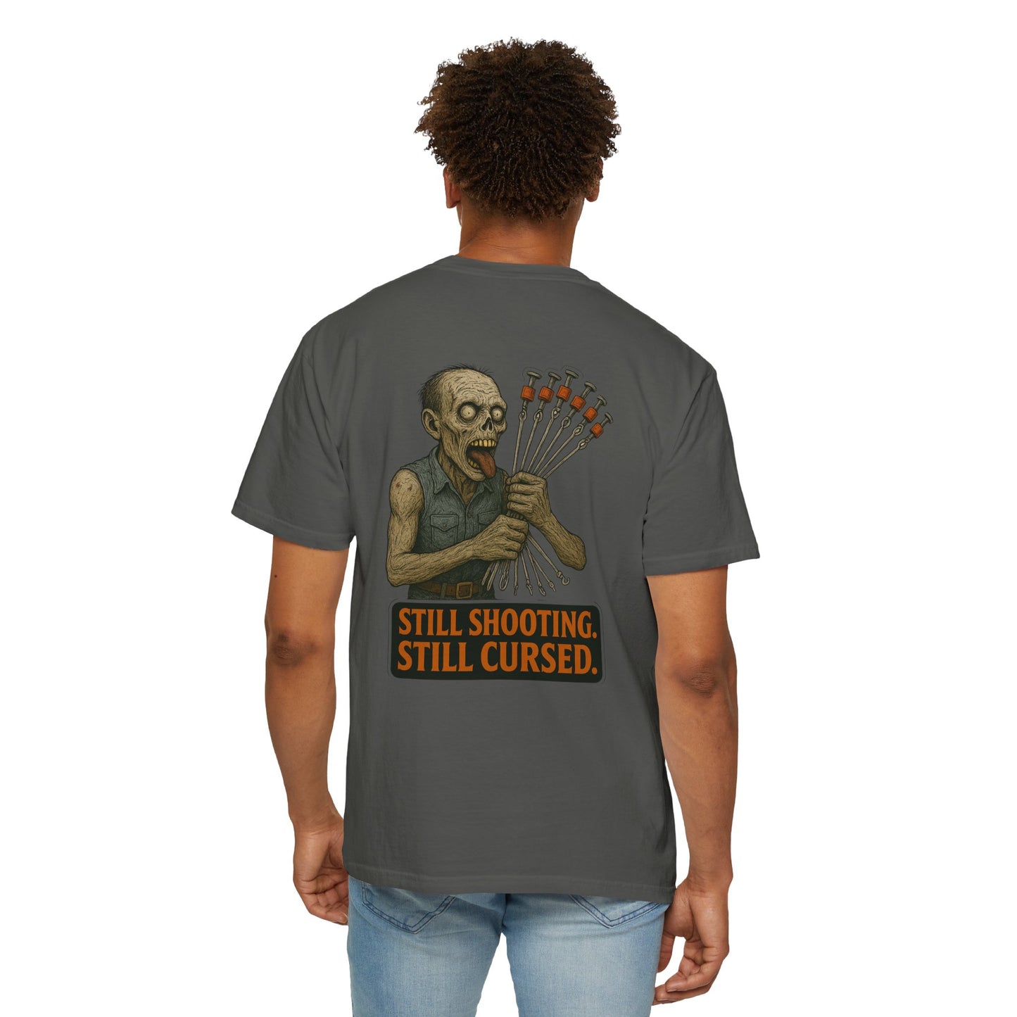 “Still Shooting. Still Cursed” (print on back)  Zombie Ceiling wire shooter - shirt