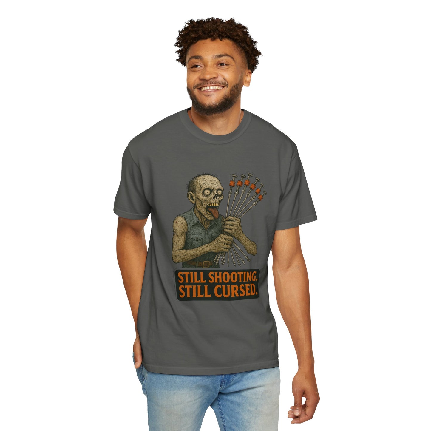 “Still Shooting. Still Cursed” (print on front) Zombie Ceiling Wire Shooter shirt